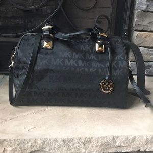 Michael Kors purse and matching wallet Barely Used